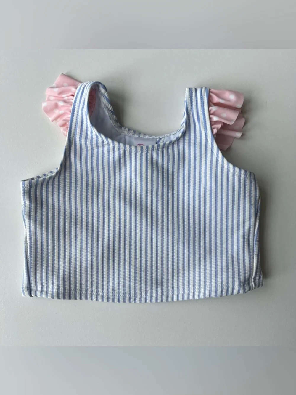 RuffleButts Blue Seersucker Two-Piece Swimsuit with Pink Polka Dot Ruffles